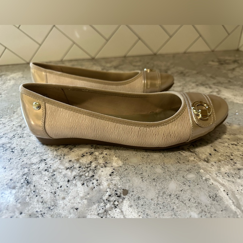 Anne Klein Sport Women’s champagne and silver ballet flats